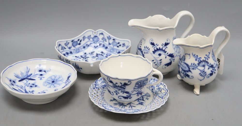 Two Meissen jugs, a cup and saucer and two dishes in blue and white onion pattern, tallest 14cm